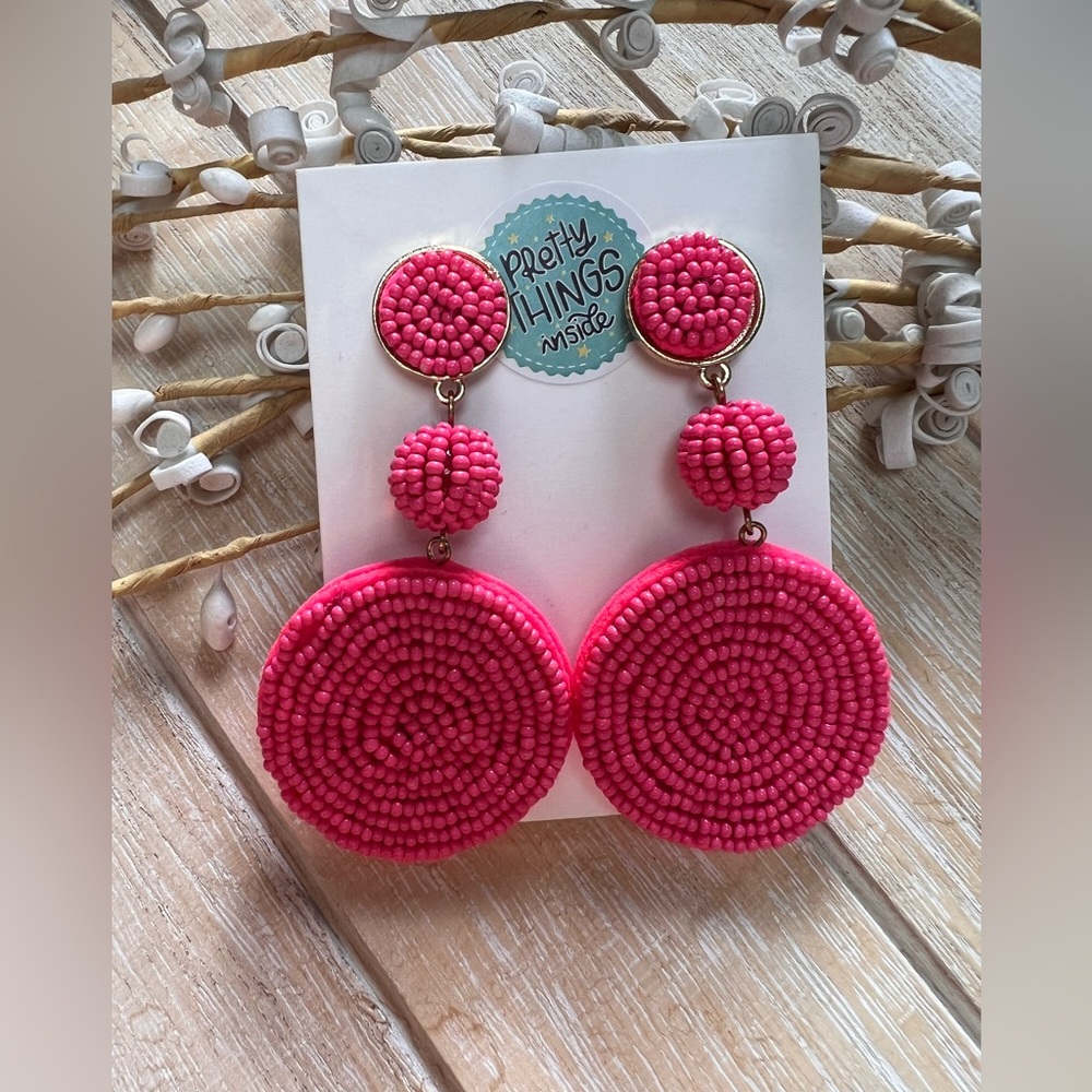 Beautiful vibrant hot pink beaded circle drop earrings